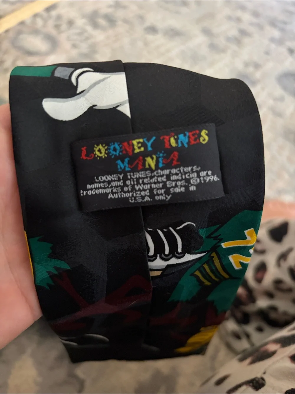 Warner Bros. Black Tie with Green, Yellow & Red Cartoon Football Characters